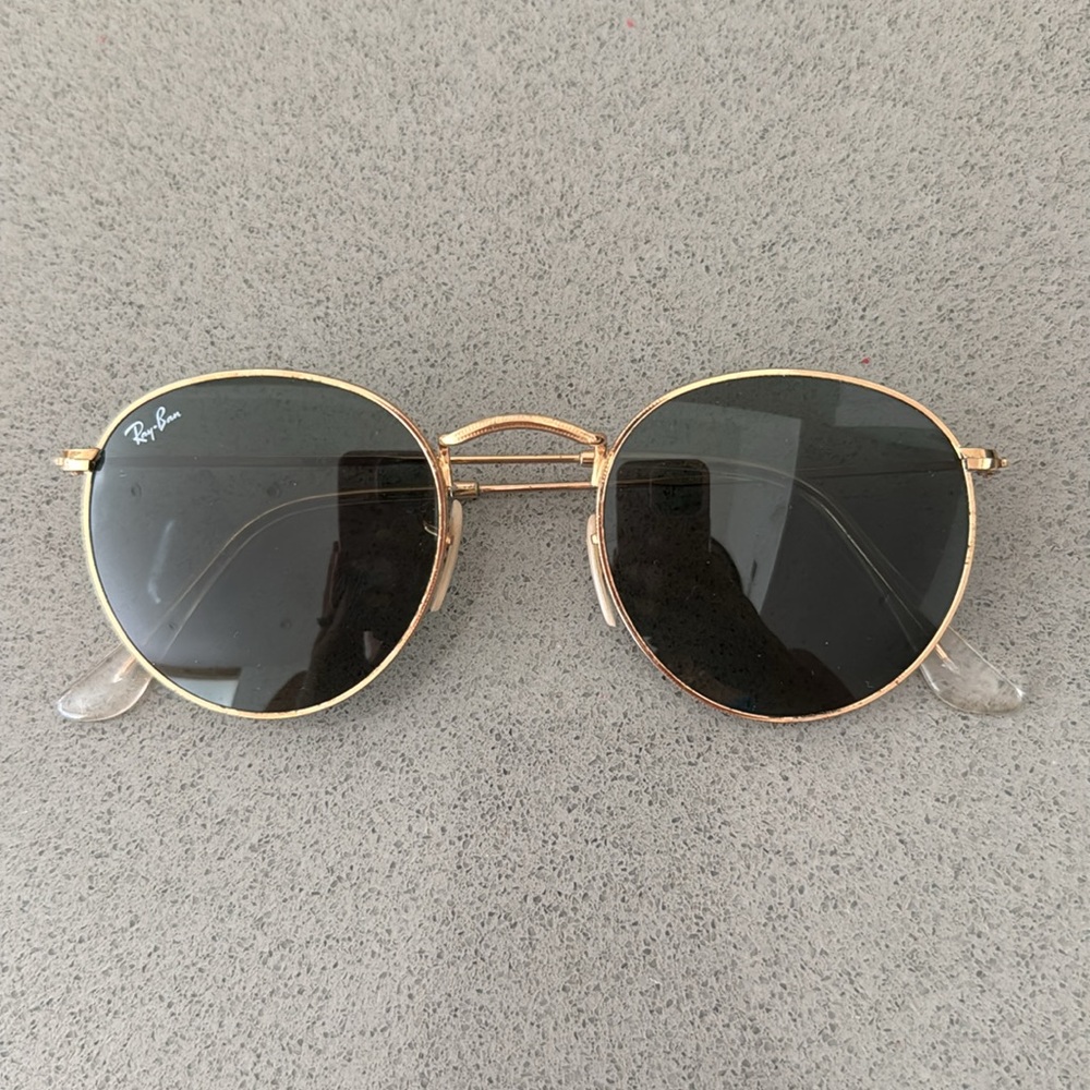 Ray-ban gold round sunglasses with black lens